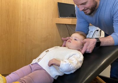 Chiropractor Moorhead MN Dr. Jace Foss Adjusting Child